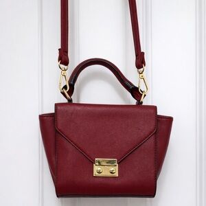 Red faux leather shoulder bag